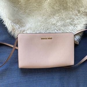 Powder pink cross body bag